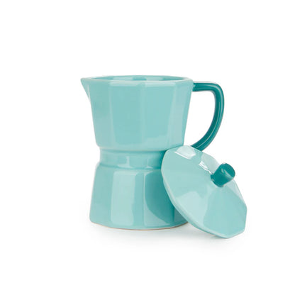 Mint green Moka mug, a hand lifting the lid off the mug