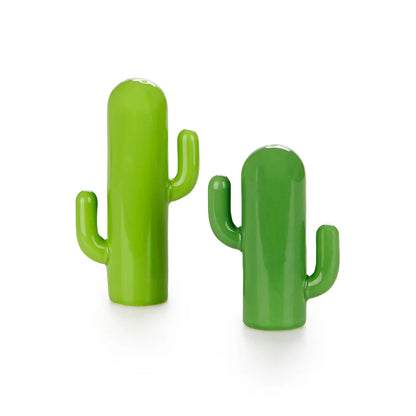 Cactus salt and pepper shakers: two cactus-shaped shakers, one light green and one dark green.