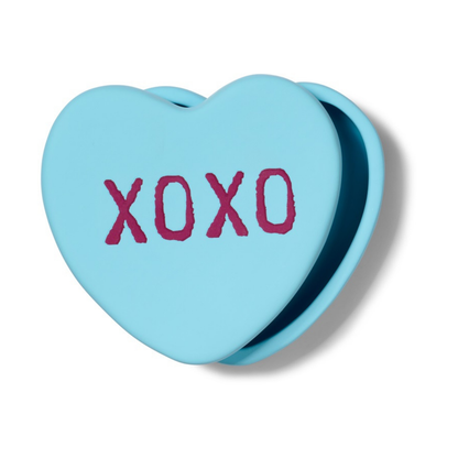 XOXO heart-shaped box in light blue, seen at an angle with the lid slightly open.