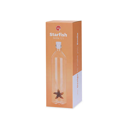 The starfish bottle shown in its orange box