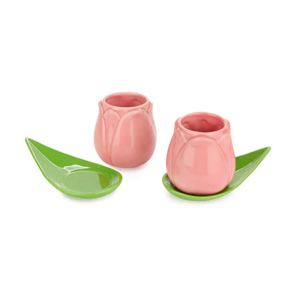 Pink Tulip coffee cup set with leaf-shaped saucers on a white background