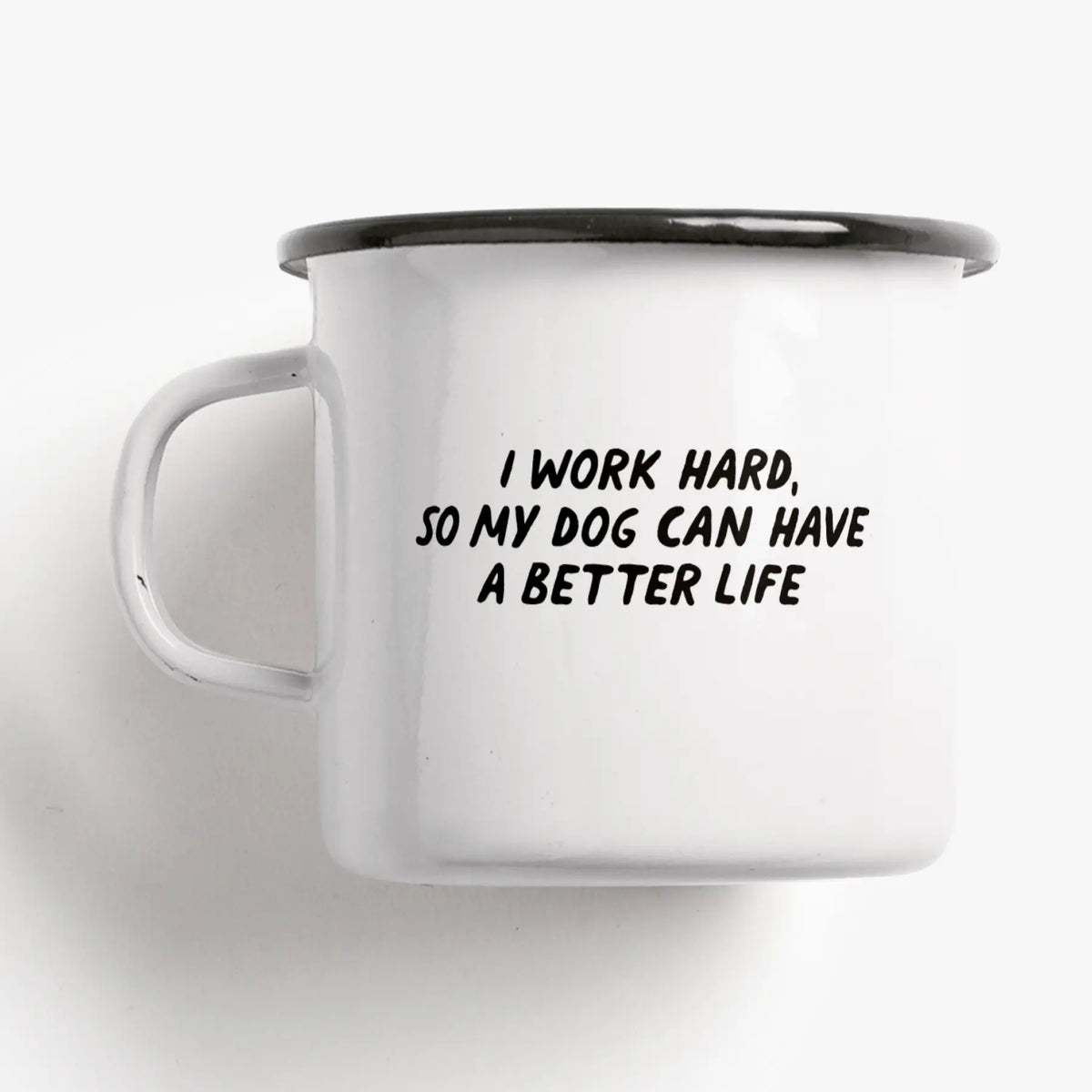 Tazza Vita da Cane: a white enamel mug printed with 'I WORK HARD, SO MY DOG CAN HAVE A BETTER LIFE'.