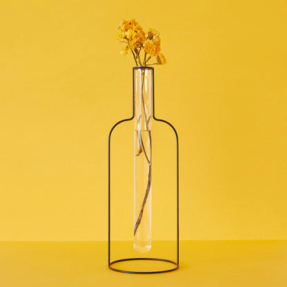 Bottle Silhouette XL vase with dried orange flowers on a yellow background