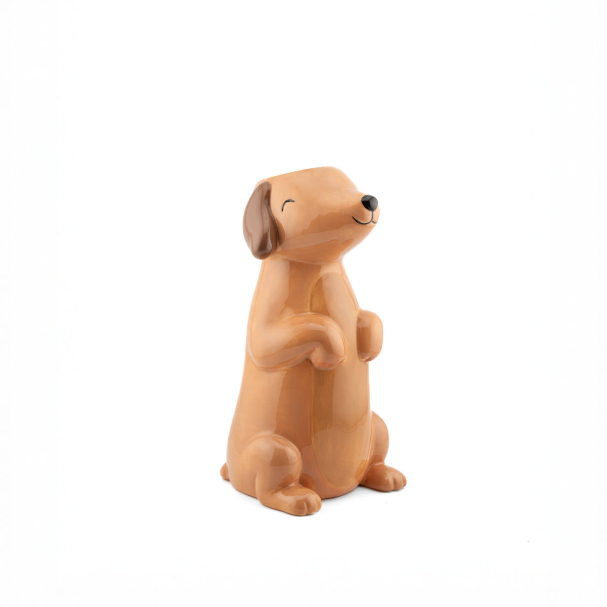 Dachshund-shaped vase in tan ceramic, sitting upright with its front paws together.