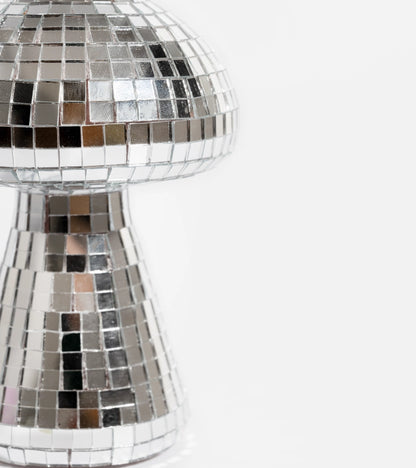 Small disco mushroom pot, close-up on the cap and stem