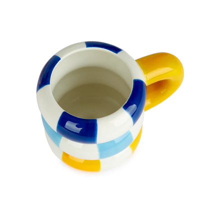 Floats Gialla mug seen from above, empty, on a white background