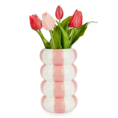Pink and white Float Alto vase with pink and red tulips, on a white background
