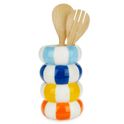 Float Alto vase with a wooden spoon and fork inside, blue background