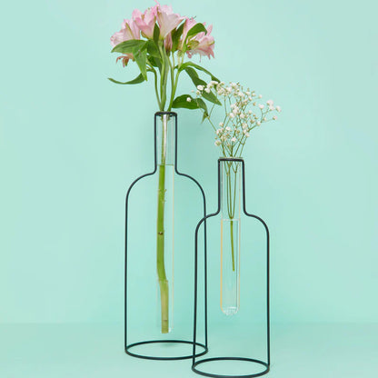 Bottle Silhouette XL vase with a smaller version, pink and white flowers, aqua background