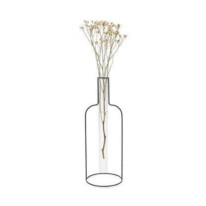 Wire vase shaped like a bottle, with dried flowers in the glass tube