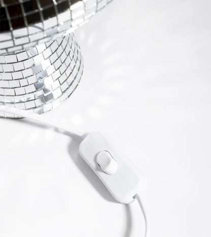 Disco mushroom lamp, detail of the white switch on the cord