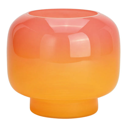 Sunset vase in pink-to-orange ombre glass, rounded shape on a pedestal base, empty.