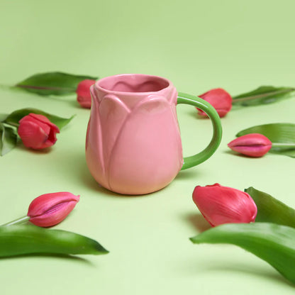 Pink Tulip Cup on a green background, surrounded by real pink tulips