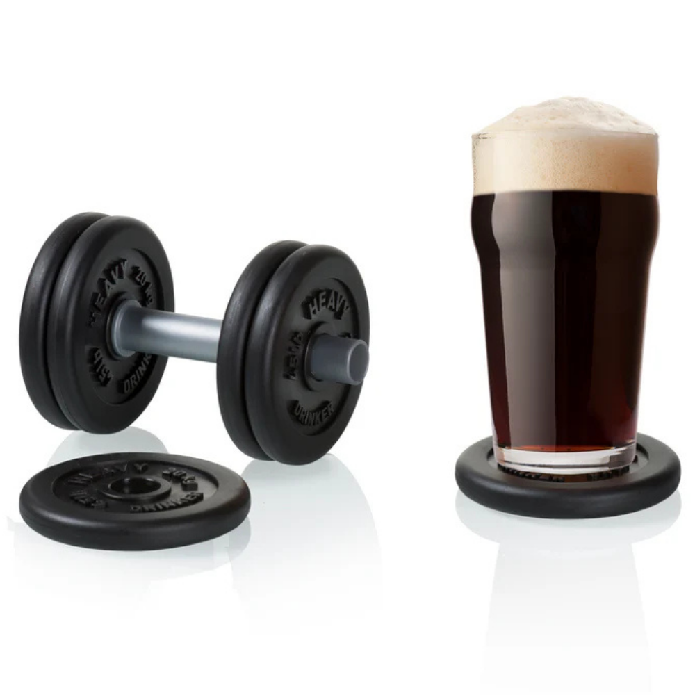 Dumbbell coasters, one holding a dumbbell weight and the other a glass of dark beer.