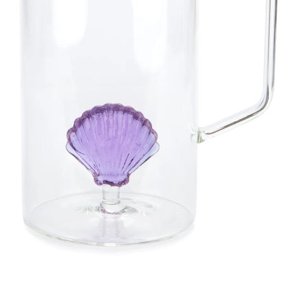 Caraffa Atlantis close-up of the purple glass shell at the base, next to the handle.