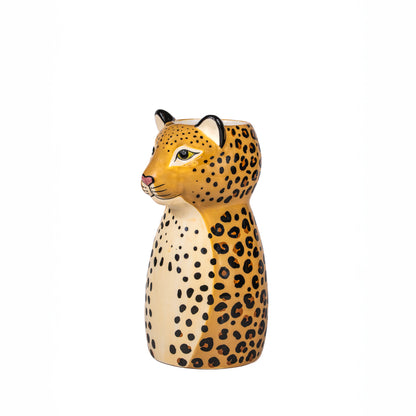 Vaso Leopardo: a leopard head-and-bust vase in yellow ceramic with black spots, empty against a white background.