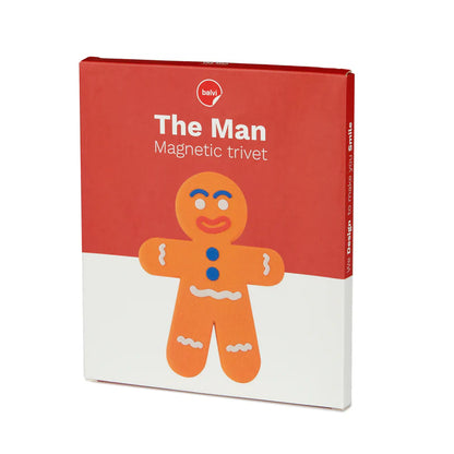 Ginger Man trivet packaging with the gingerbread man printed on the red box.
