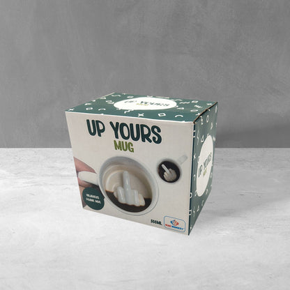 Middle Finger mug green packaging with the illustration of the finger inside the mug.