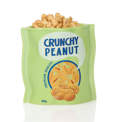 Crunchy Peanut vase shaped like a green bag, filled with roasted peanuts.