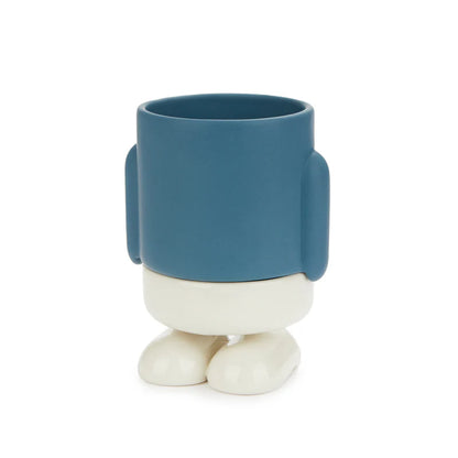 Mini Mr. Standy planter blue with white legs and feet, empty on a white background.