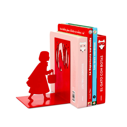 Red bookend shaped like Little Red Riding Hood carrying a basket, on white