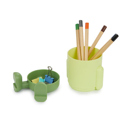 The green pencil holder with its matching clip tray holding coloured clips