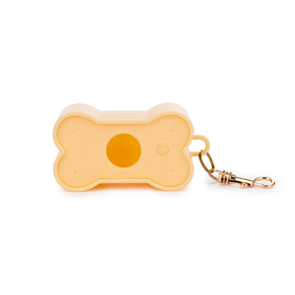 Peach Biscuit dog waste bag holder, closed on a white background