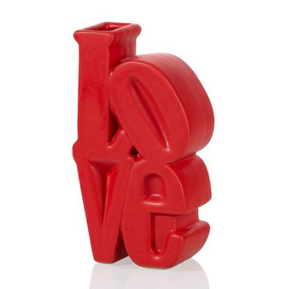 Love vase in red shaped like the letters LOVE, front view on a white background.